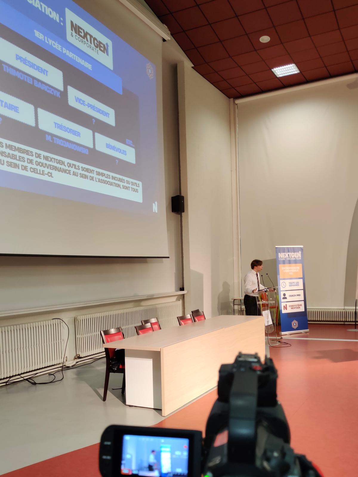 Thimotei presenting NextGen while the event is being filmed
