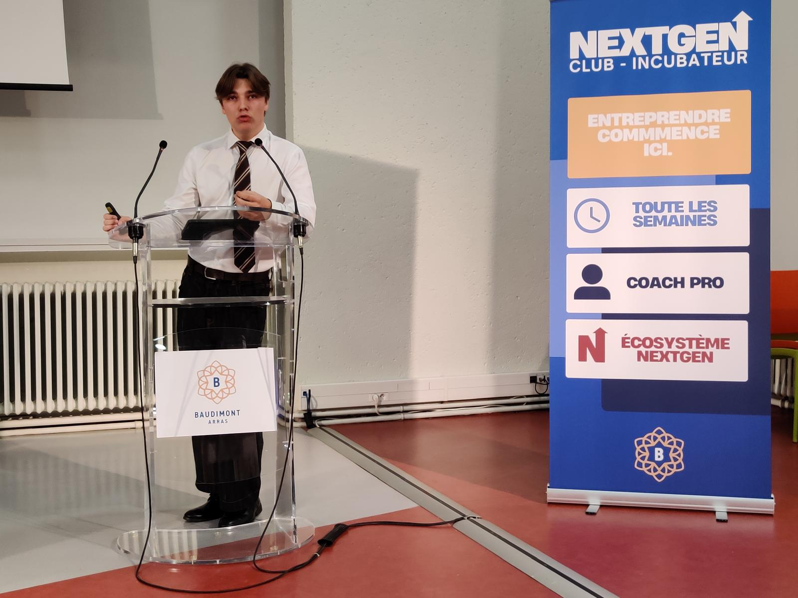 Thimotei presenting NextGen beside its official banner